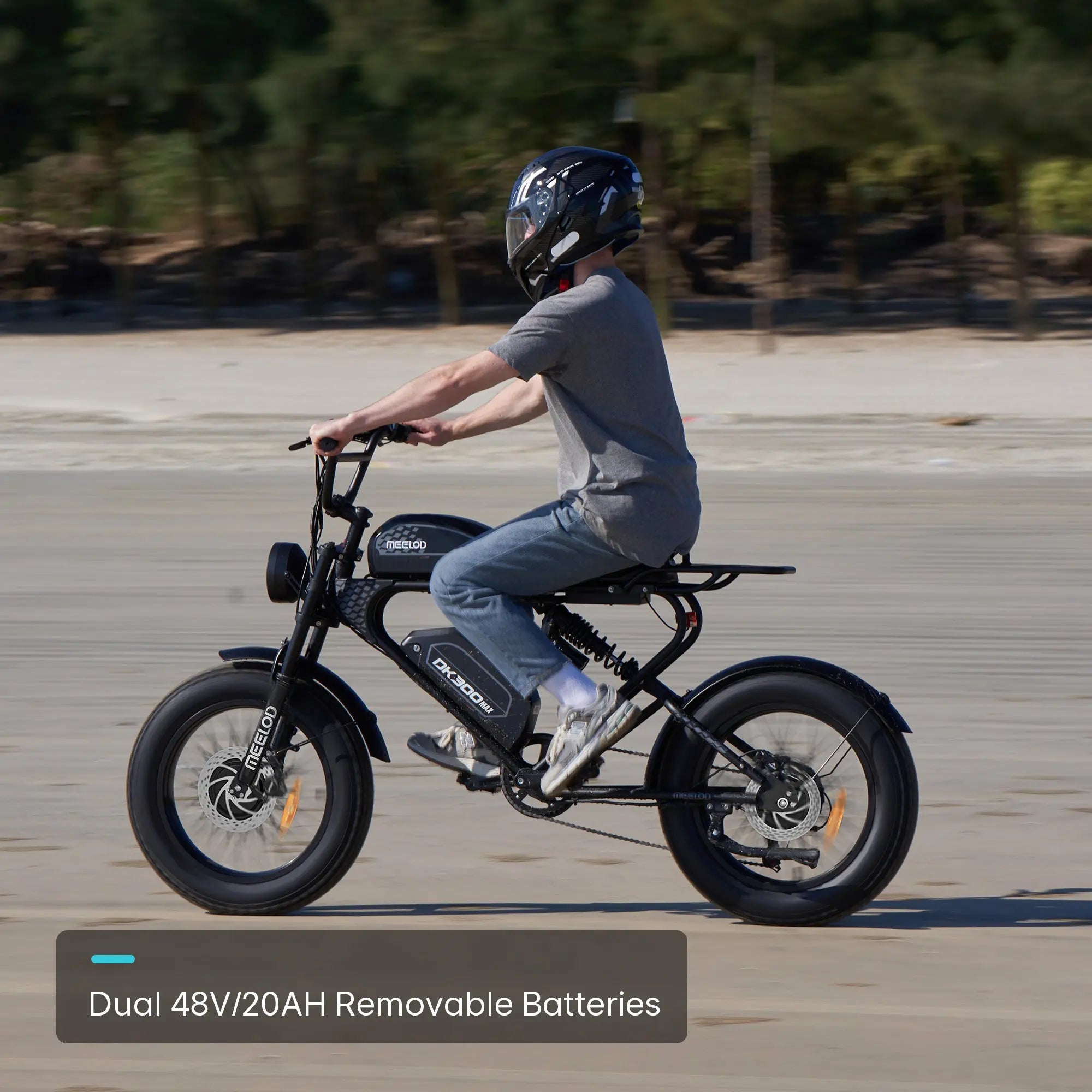 A man wearing a helmet riding a Meelod long-range electric bike