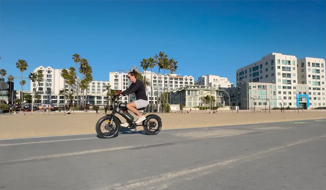 Fat tire dual motor e-bike riding on off-road trail