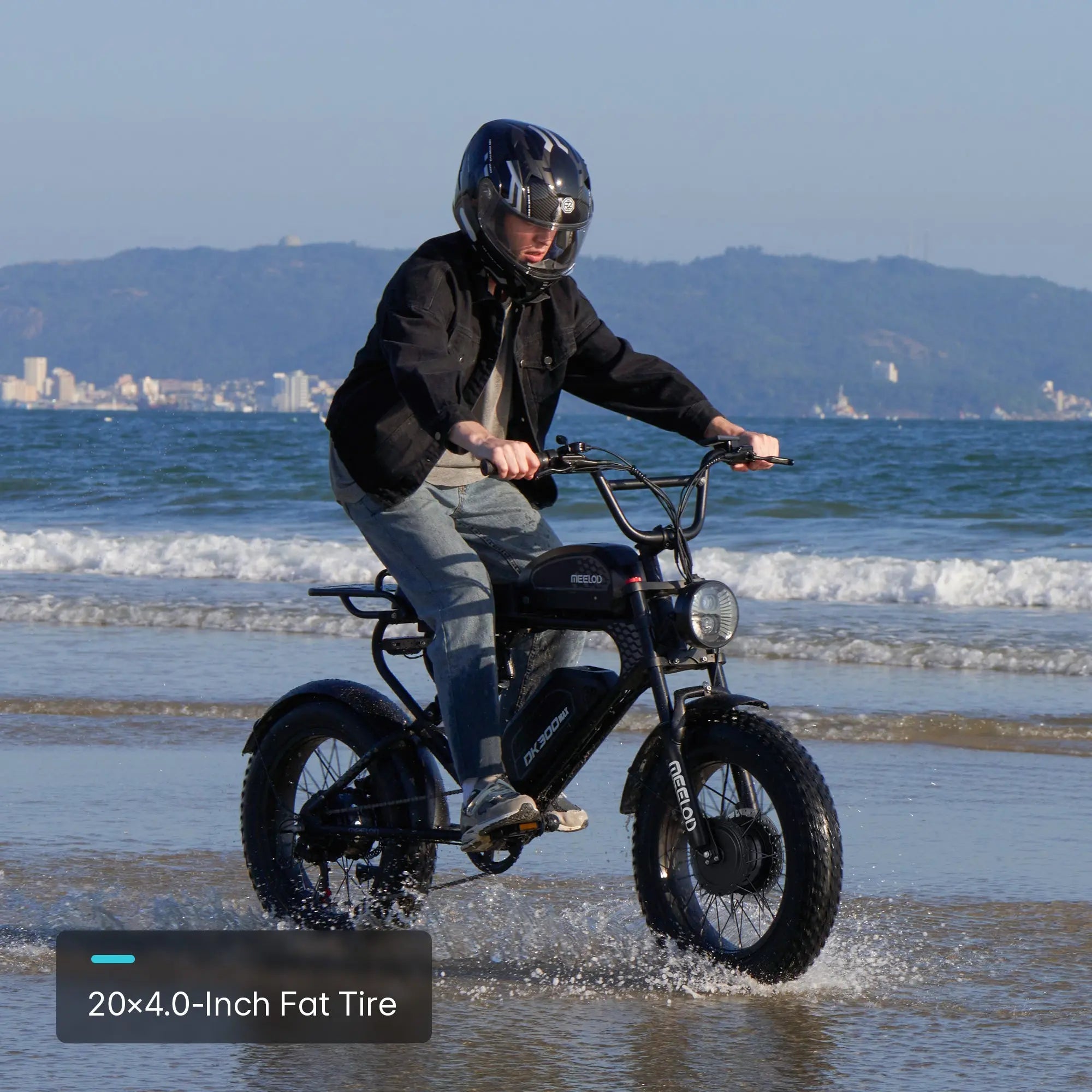 A man riding a Meelod moped-style electric bike along the coast