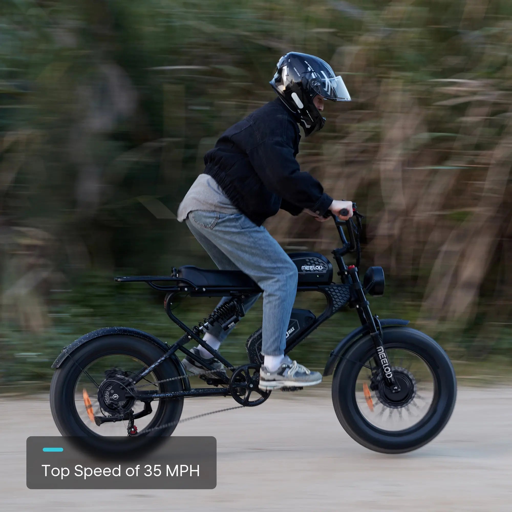 A man standing while riding a Meelod moped-style electric bike