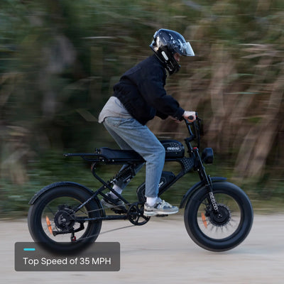 A man standing while riding a Meelod moped-style electric bike